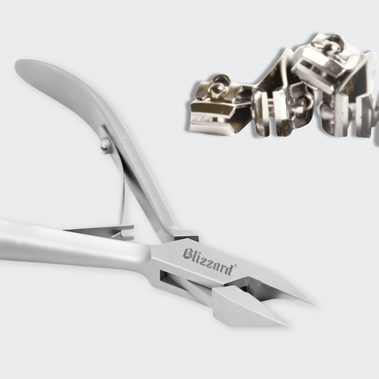 Close-up of a pair of silver scissors with 'Blizzard' branding on a white background