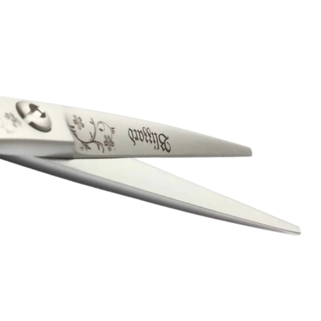 Hair scissors with floral design on a white background