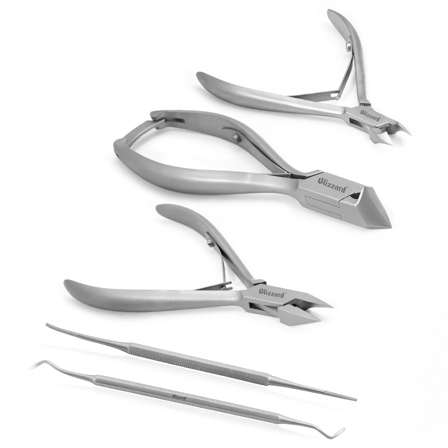 Set of nail clippers and cuticle nippers on a white background