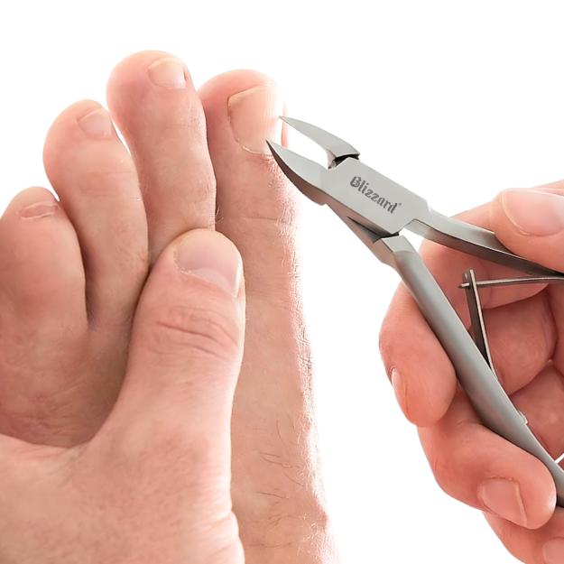Person using a pair of nail clippers on their toes with a white background