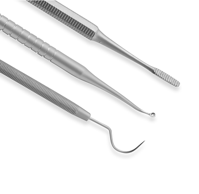 Two dental tools on a white background